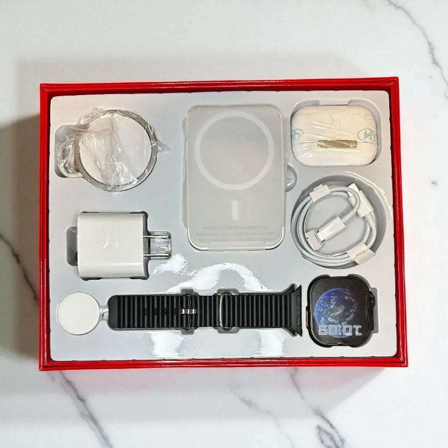 Kit de 6 piezas con reloj inteligente, batería, cargador magnético y audífonos, presentado en caja roja ideal para regalo, perfecto para deporte, música y uso diario, diseño moderno y funcional que combina tecnología y