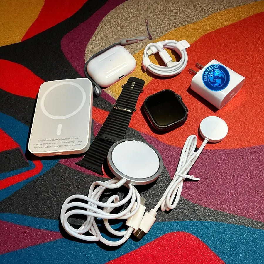 Kit de 6 piezas con reloj inteligente, batería, cargador magnético y audífonos, presentado en caja roja ideal para regalo, perfecto para deporte, música y uso diario, diseño moderno y funcional que combina tecnología y