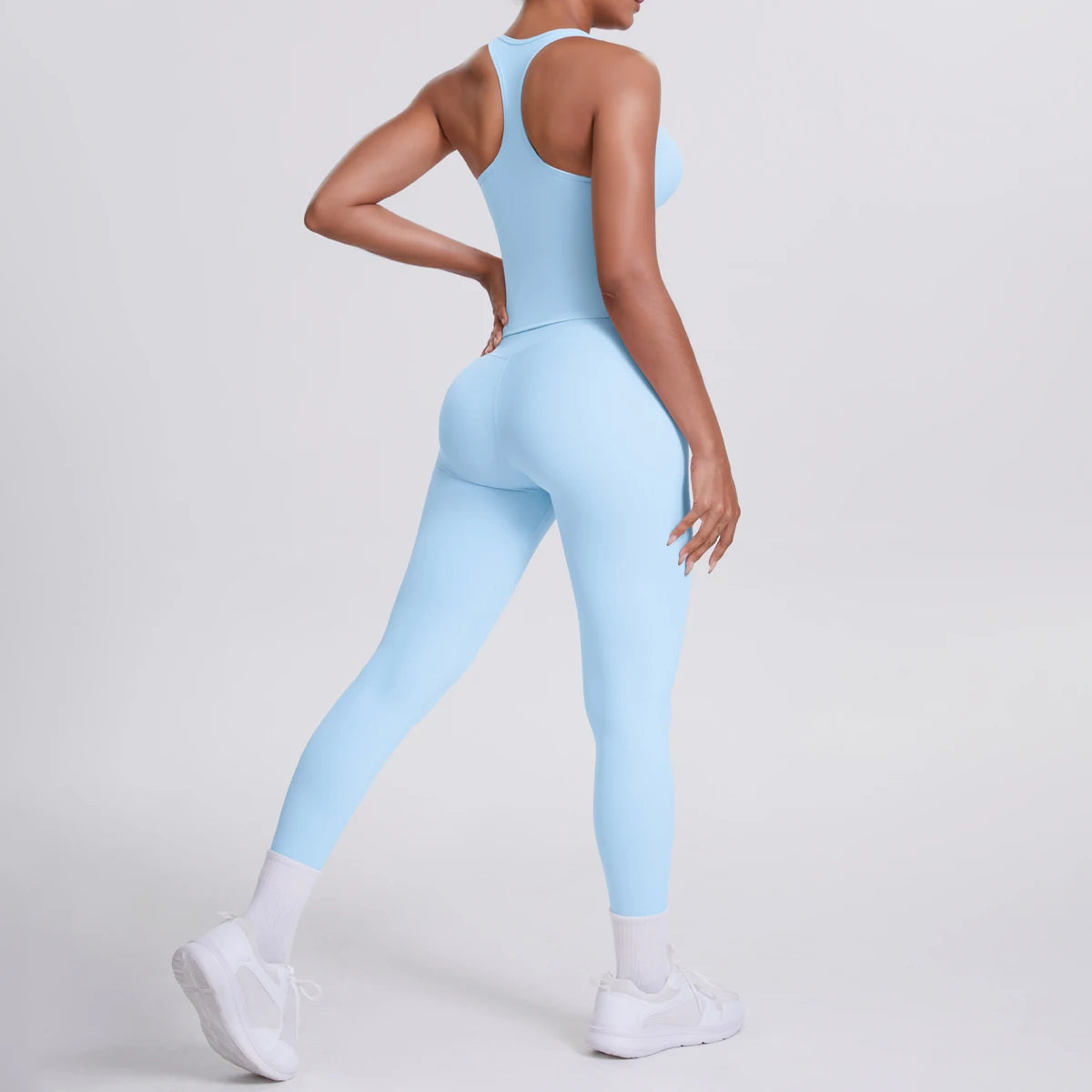 Hamidou - Conjunto de yoga de 2 piezas para mujer: leggings de fitness de secado rápido con efecto push-up y top deportivo con espalda en I de color liso.
