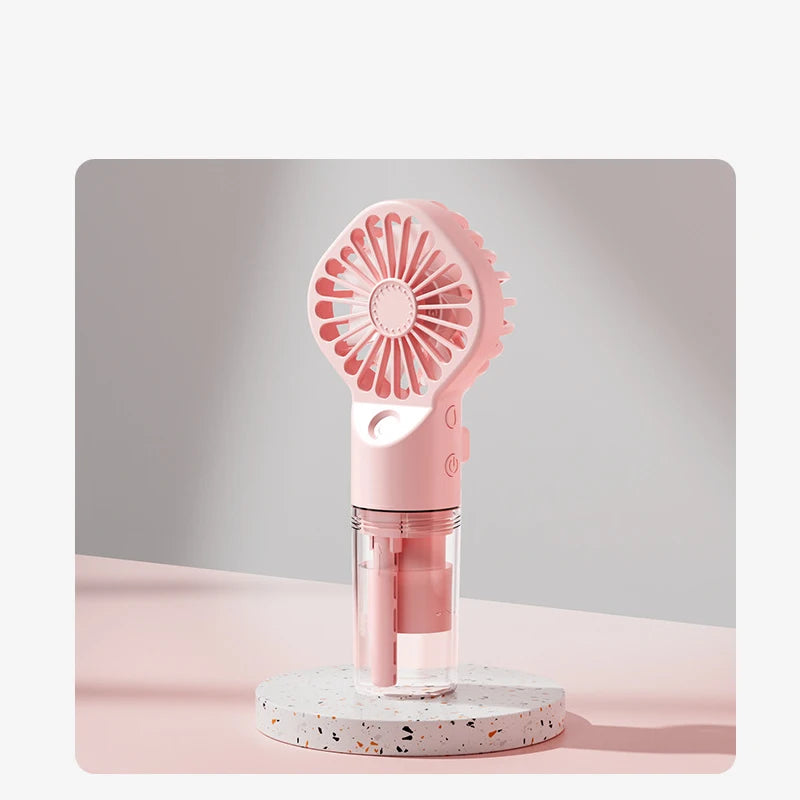 Ventilador de pulverización portátil de mano, ventilador de niebla de pulverización de agua, miniventilador de dormitorio de estudiantes, suministros de verano, herramientas de refrigeración, ventilador pequeño para exte