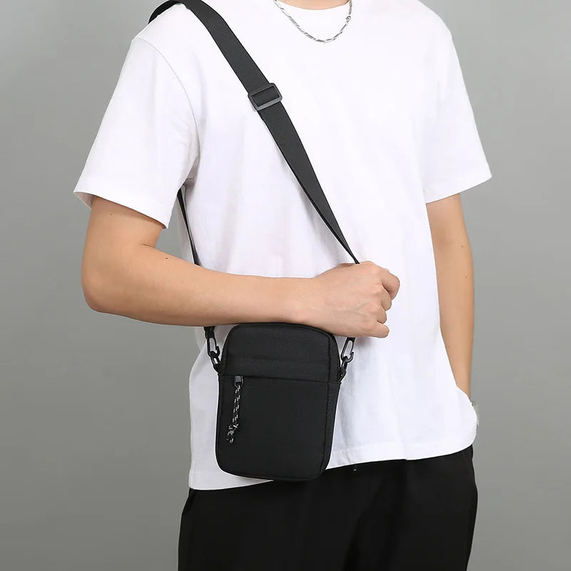 Bandolera pequeña de lona con cremallera para hombre, bolso de hombro cruzado Simple, Mini bolso para teléfono