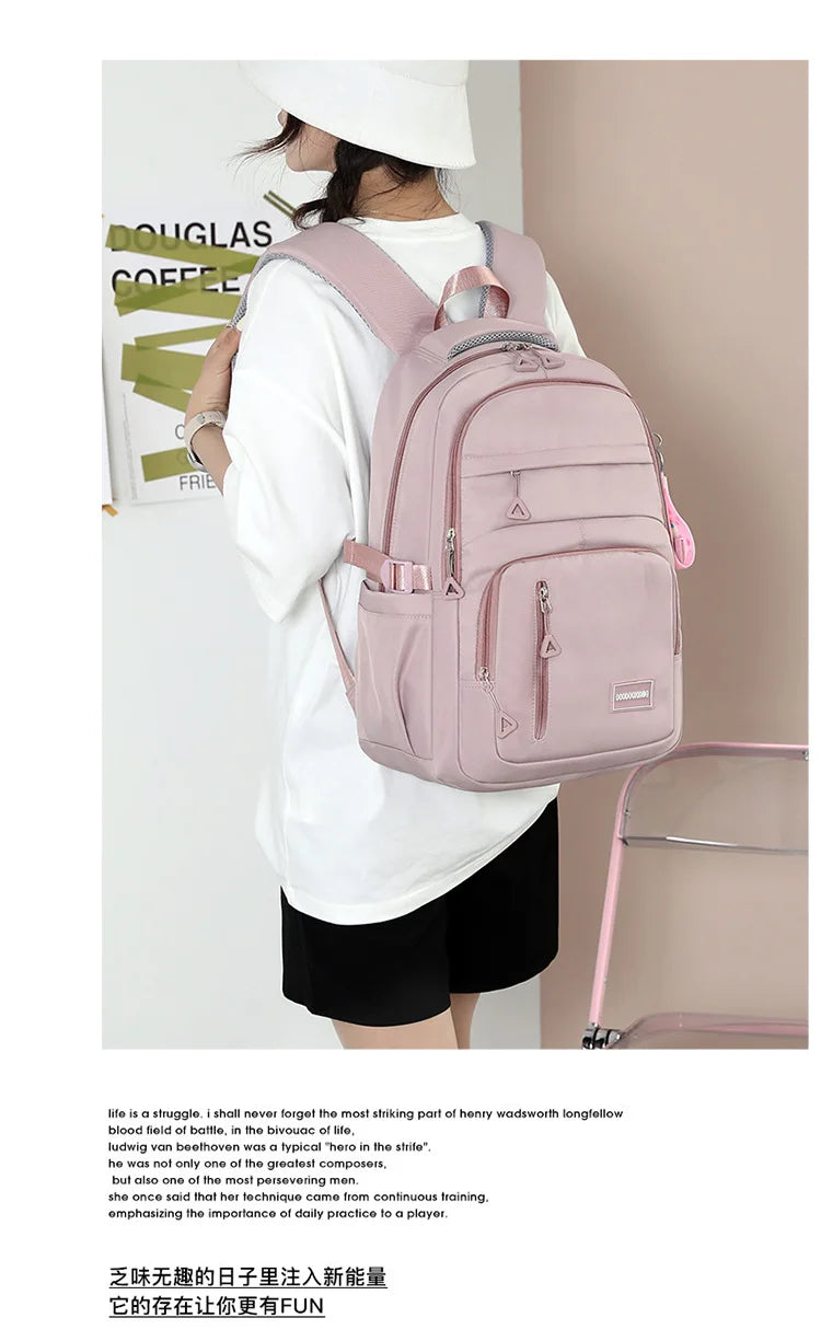 Mochila escolar de nailon con colgante para niñas, de viaje con múltiples bolsillos morral, impermeable, informal, estilo Simple