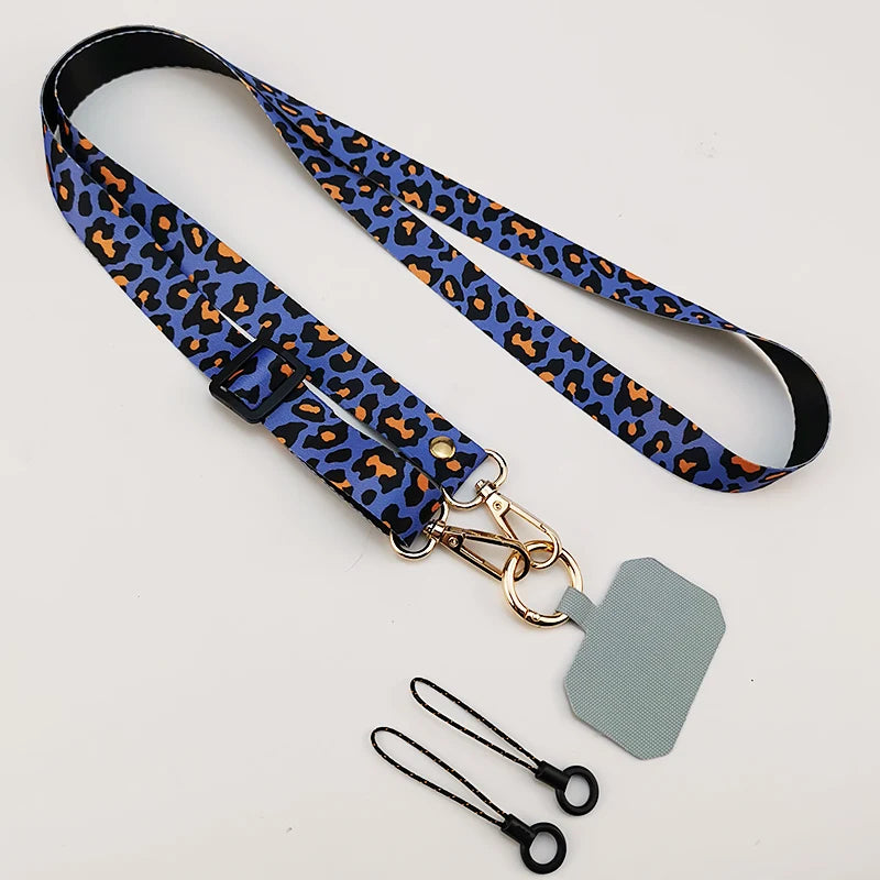 Cordón cruzado para teléfono móvil, correa para el cuello, cordón para teléfono móvil con estampado de leopardo, cadena con junta Universal para todas las fundas de teléfono