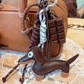 Colgante de bolso de cuerda trenzada para bolsos de mujer, llavero de alta calidad, colgante estilo perro salchicha, accesorios adecuados para bolso