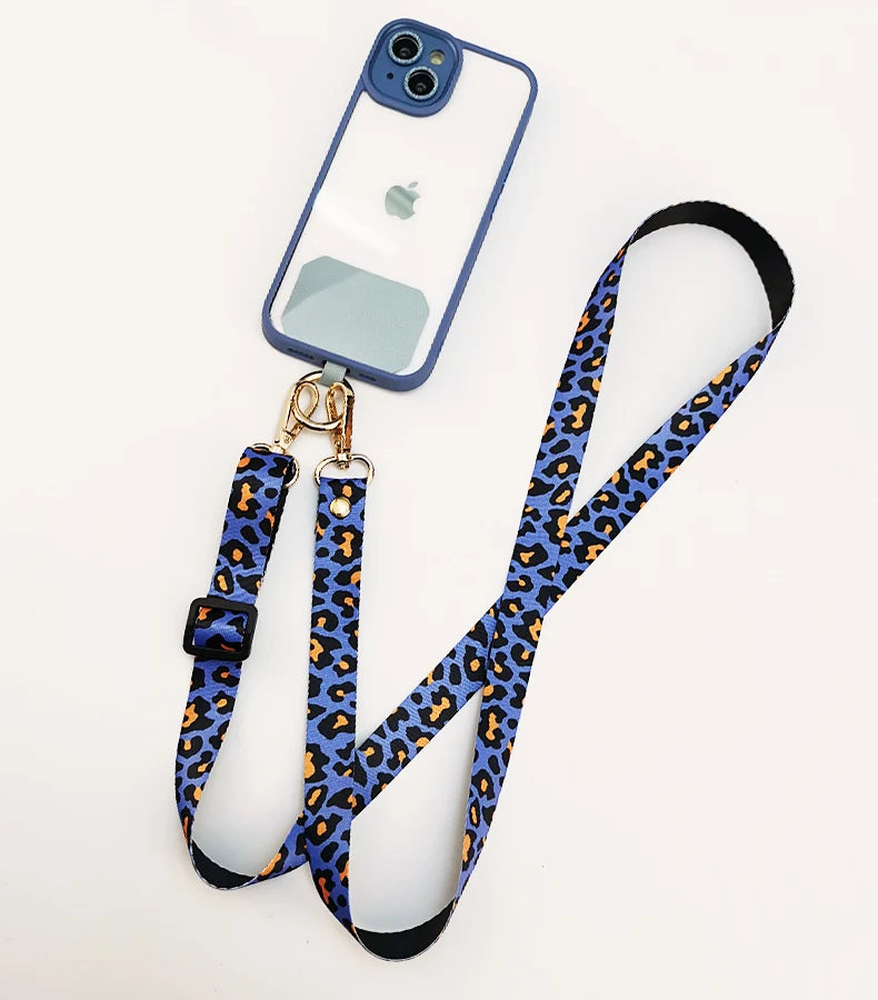 Cordón cruzado para teléfono móvil, correa para el cuello, cordón para teléfono móvil con estampado de leopardo, cadena con junta Universal para todas las fundas de teléfono