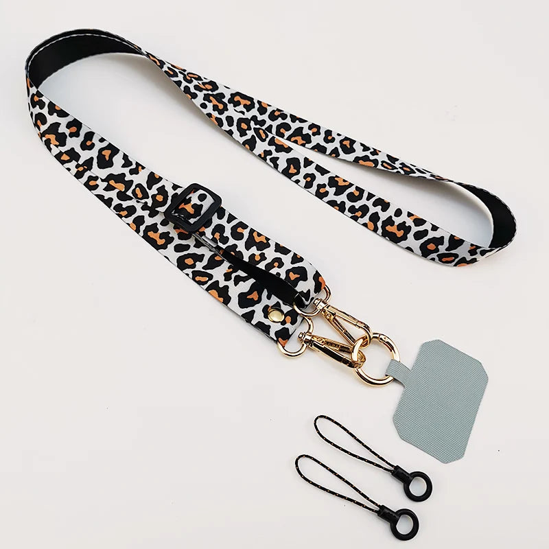 Cordón cruzado para teléfono móvil, correa para el cuello, cordón para teléfono móvil con estampado de leopardo, cadena con junta Universal para todas las fundas de teléfono