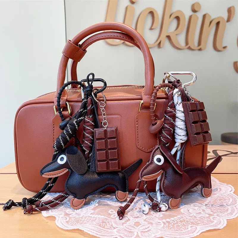 Colgante de bolso de cuerda trenzada para bolsos de mujer, llavero de alta calidad, colgante estilo perro salchicha, accesorios adecuados para bolso