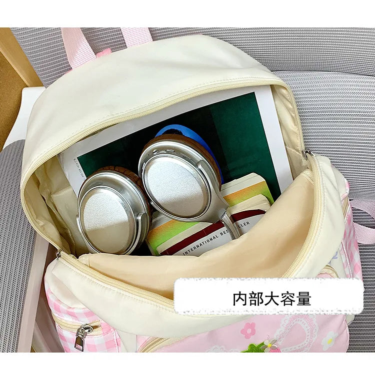 Mochila escolar ligera de nailon a cuadros para niña, bonita mochila impermeable con bordado de fresa Kawaii para ir al trabajo