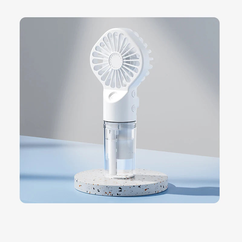 Ventilador de pulverización portátil de mano, ventilador de niebla de pulverización de agua, miniventilador de dormitorio de estudiantes, suministros de verano, herramientas de refrigeración, ventilador pequeño para exte