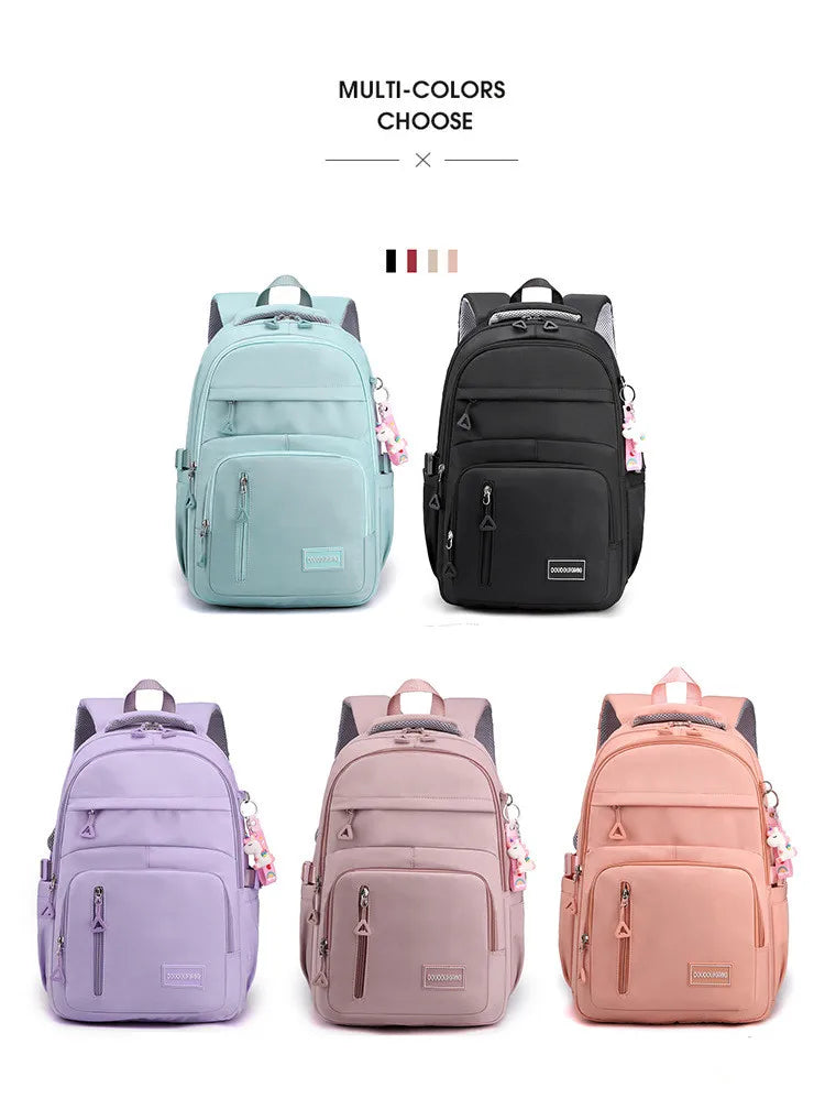 Mochila escolar de nailon con colgante para niñas, de viaje con múltiples bolsillos morral, impermeable, informal, estilo Simple