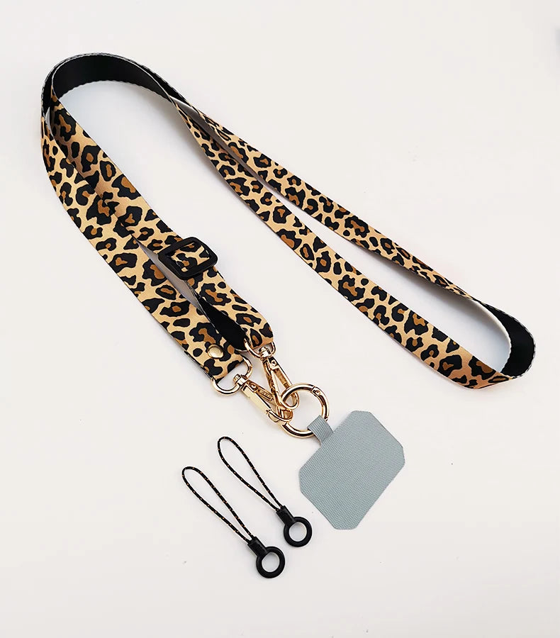 Cordón cruzado para teléfono móvil, correa para el cuello, cordón para teléfono móvil con estampado de leopardo, cadena con junta Universal para todas las fundas de teléfono