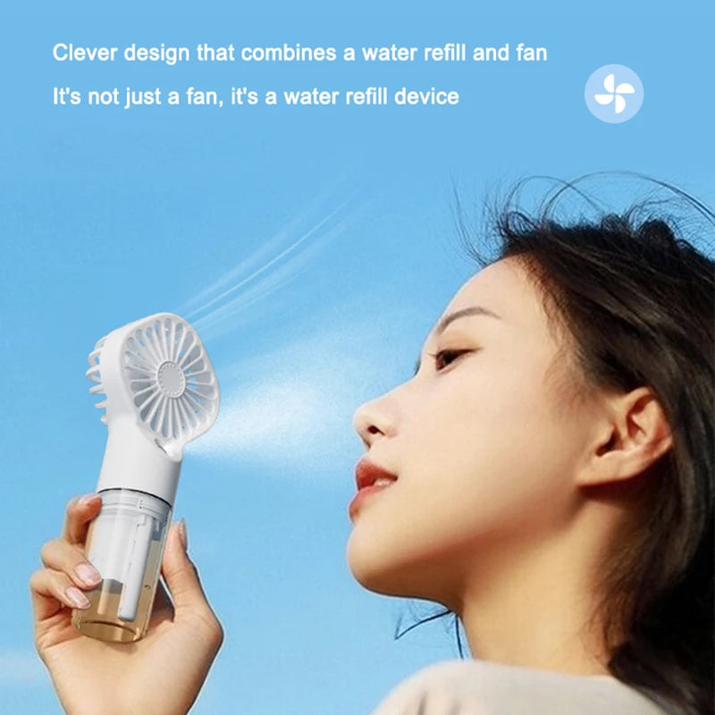 Ventilador de pulverización portátil de mano, ventilador de niebla de pulverización de agua, miniventilador de dormitorio de estudiantes, suministros de verano, herramientas de refrigeración, ventilador pequeño para exte