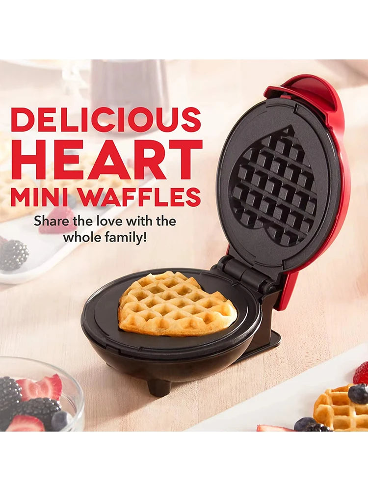 Una mini waflera portátil familiar con forma de corazón, una pequeña waflera con forma de corazón, para hacer waffles con forma de corazón y papas fritas con forma de corazón para el desayuno.