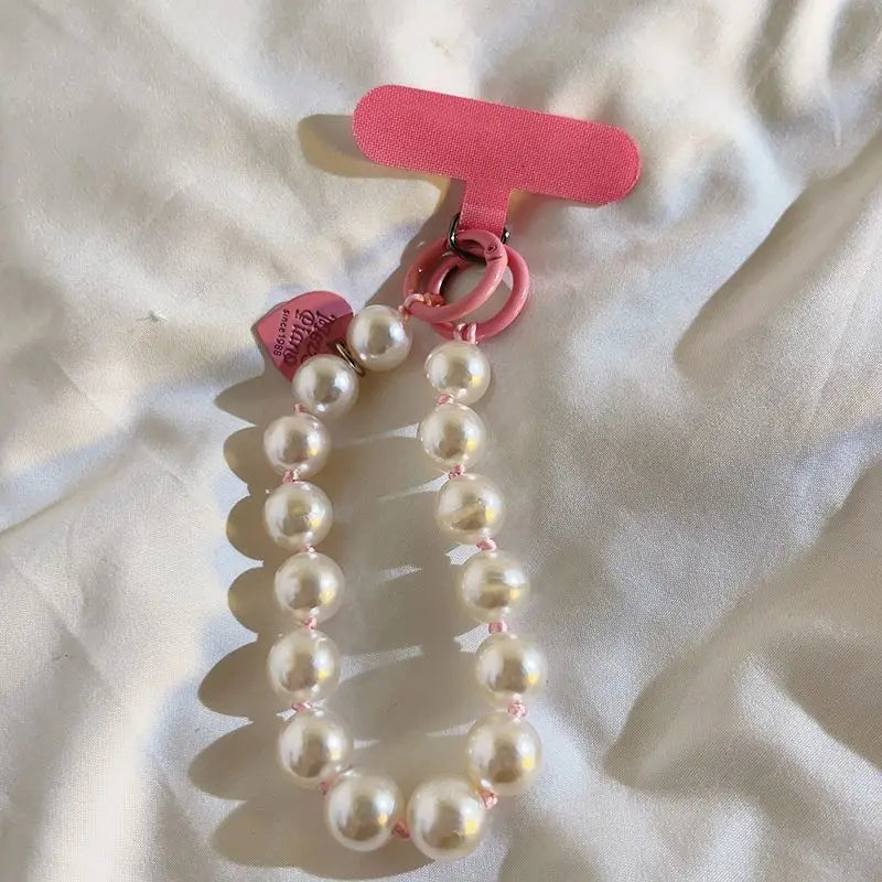 1 x Correa de muñeca unisex para teléfono móvil, sencilla y minimalista; disponible en 8 colores con dijes de cuentas en forma de corazón; versátil para móvil