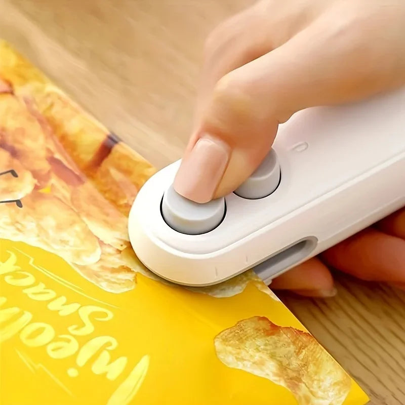 Mini máquina de sellado de bolsas de aperitivos, carga USB con cortador de chips, bolsa de plástico, dispositivo de almacenamiento de alimentos frescos