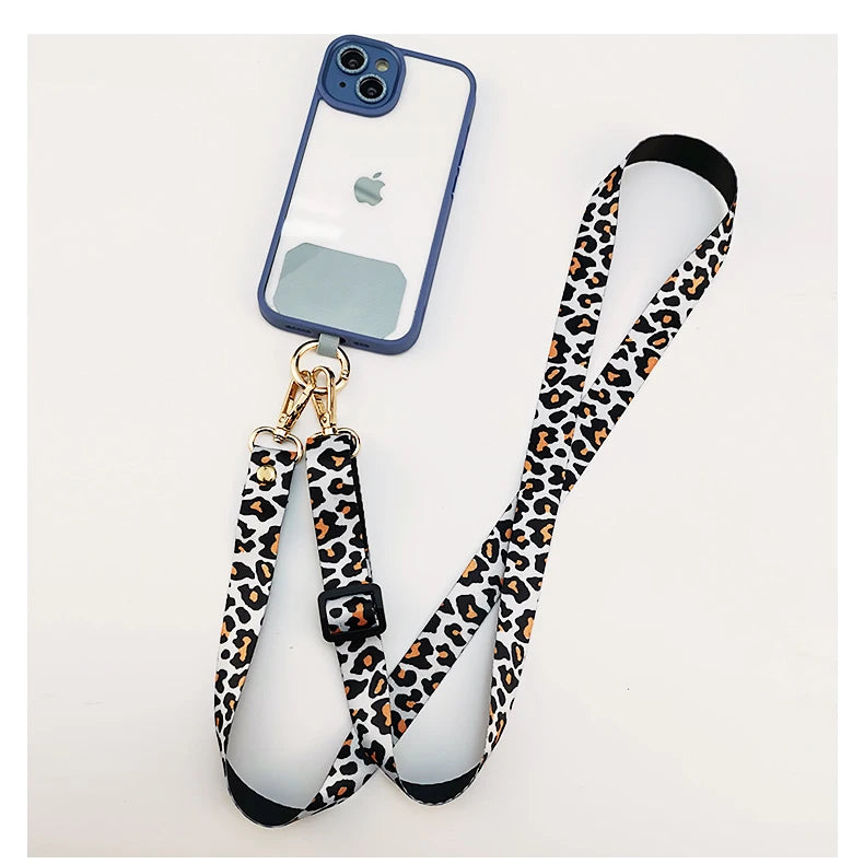 Cordón cruzado para teléfono móvil, correa para el cuello, cordón para teléfono móvil con estampado de leopardo, cadena con junta Universal para todas las fundas de teléfono