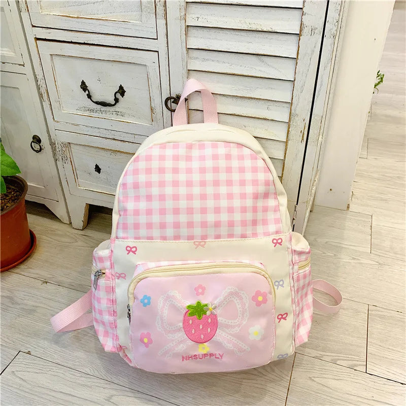 Mochila escolar ligera de nailon a cuadros para niña, bonita mochila impermeable con bordado de fresa Kawaii para ir al trabajo
