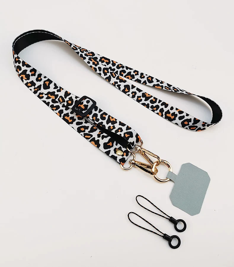 Cordón cruzado para teléfono móvil, correa para el cuello, cordón para teléfono móvil con estampado de leopardo, cadena con junta Universal para todas las fundas de teléfono