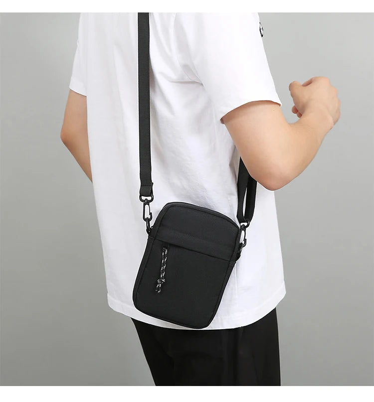 Bandolera pequeña de lona con cremallera para hombre, bolso de hombro cruzado Simple, Mini bolso para teléfono