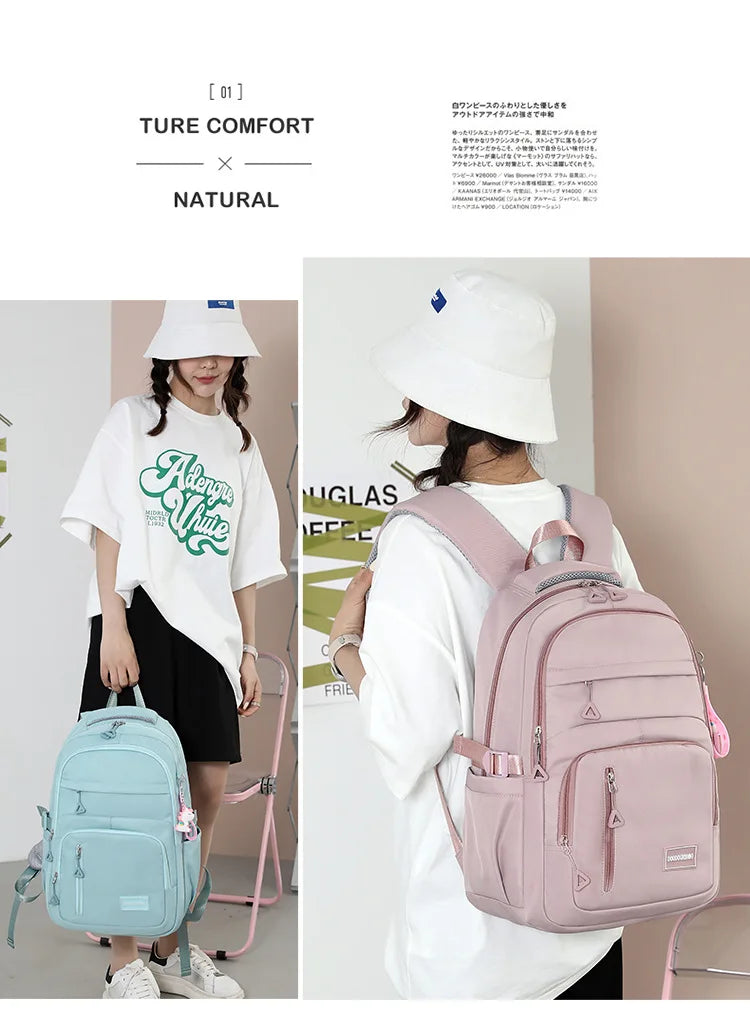 Mochila escolar de nailon con colgante para niñas, de viaje con múltiples bolsillos morral, impermeable, informal, estilo Simple