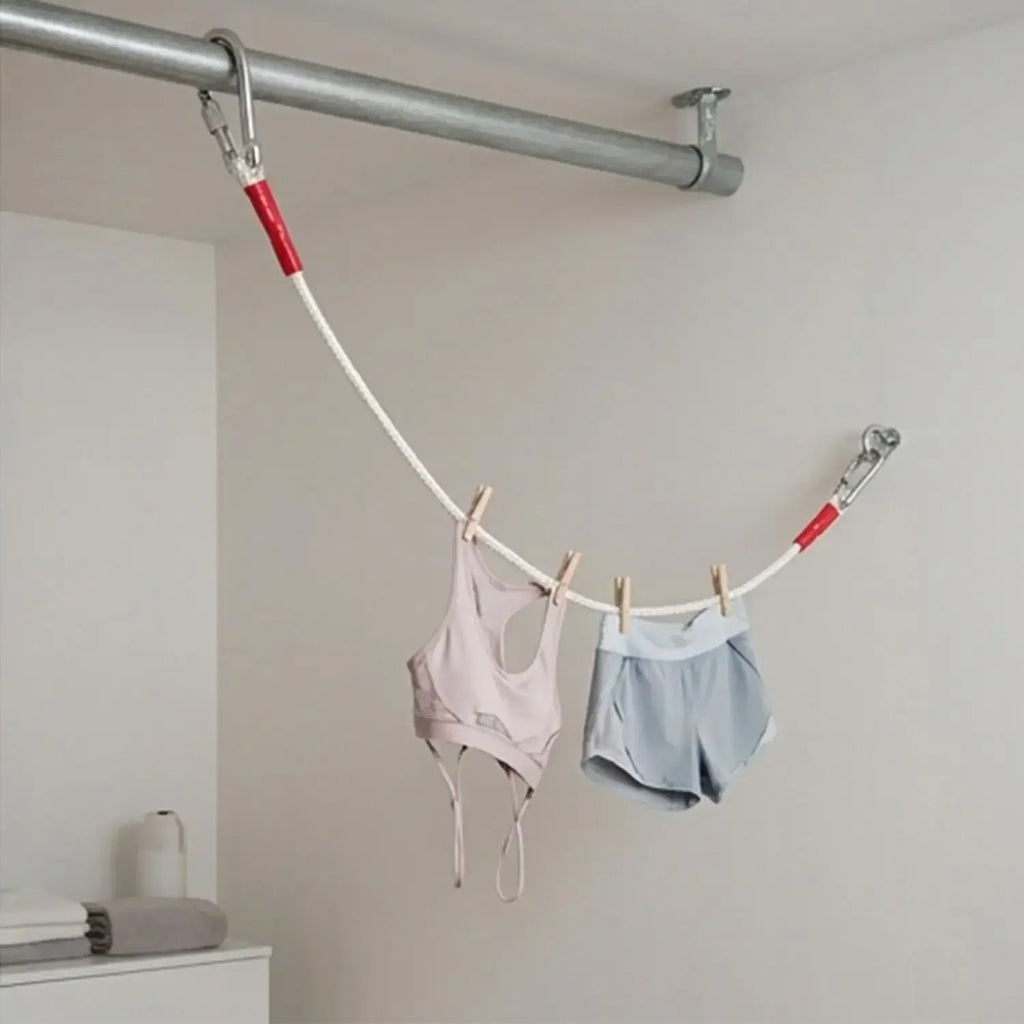 Cuerda de lavandería portátil a prueba de viento con núcleo de alambre de acero para secar ropa, ideal para camping y viajes al aire libre, con doble mosquetón.