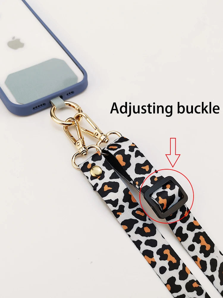 Cordón cruzado para teléfono móvil, correa para el cuello, cordón para teléfono móvil con estampado de leopardo, cadena con junta Universal para todas las fundas de teléfono