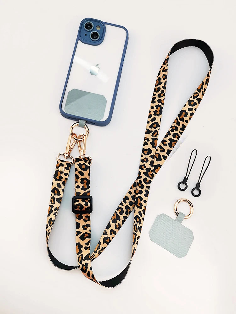 Cordón cruzado para teléfono móvil, correa para el cuello, cordón para teléfono móvil con estampado de leopardo, cadena con junta Universal para todas las fundas de teléfono