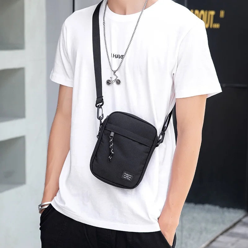 Bolso cruzado pequeño Oxford para hombre, bolso de hombro informal, billetera para teléfono móvil, ligero, Simple, compacto, adecuado para llevar diario